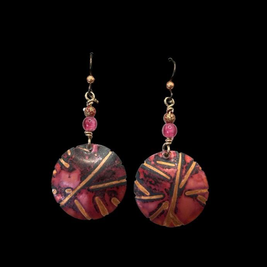 Wire wrap-patterned copper earrings with druk glass
